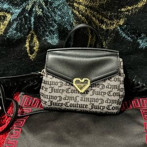 The cutest little bag by Juicy Couture!